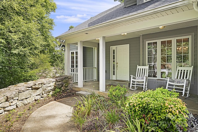 doorway to property with covered porch