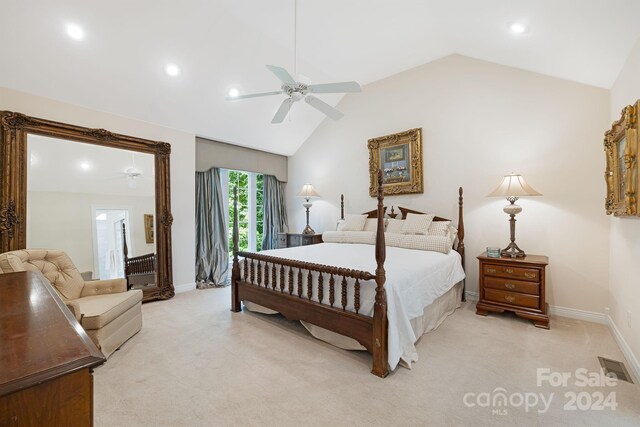 carpeted bedroom with lofted ceiling and ceiling fan