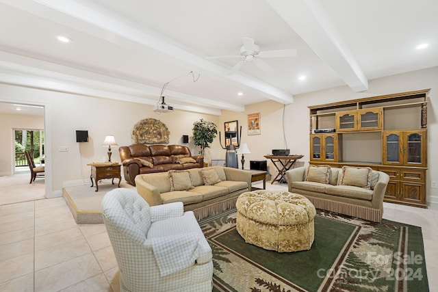 tiled living room featuring beamed ceiling and ceiling fan