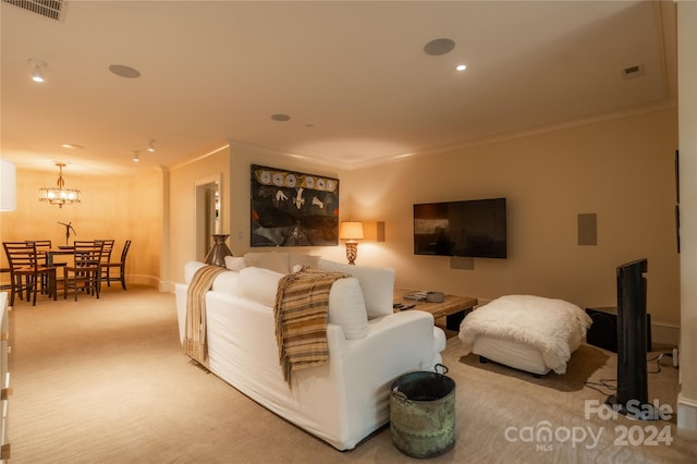 carpeted living room featuring an inviting chandelier and ornamental molding