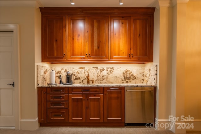 bar featuring decorative backsplash, light carpet, sink, dishwasher, and light stone counters