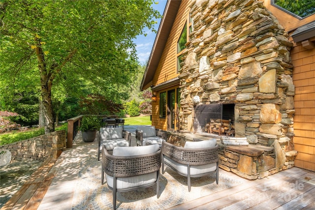 view of patio / terrace with a wooden deck and outdoor lounge area