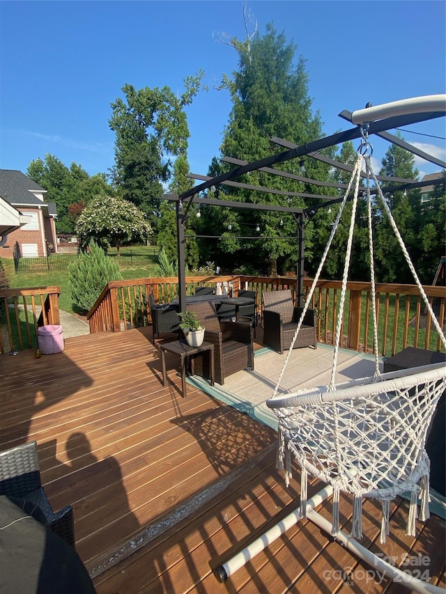 deck featuring a pergola