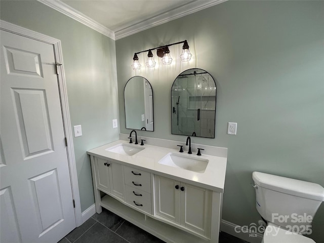 bathroom featuring vanity, tile patterned floors, ornamental molding, and toilet