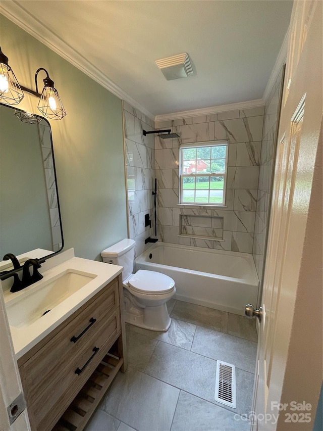 full bathroom featuring crown molding, tiled shower / bath, vanity, and toilet