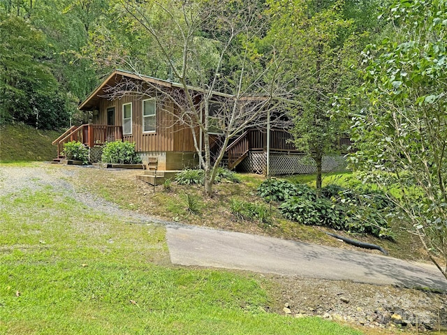 833 Sprinkle Branch Rd, Marshall, NC 28753 - view of property exterior with stairway, a yard, and a wooded view