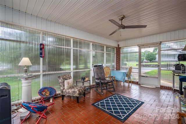 sunroom / solarium with ceiling fan