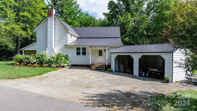 view of front of house with a carport