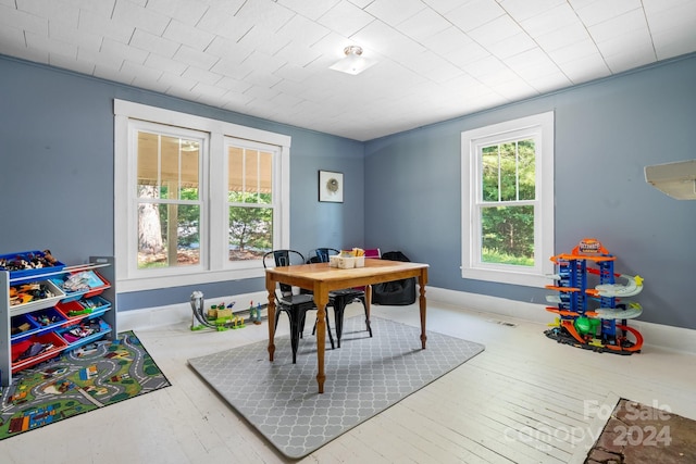 office area with light hardwood / wood-style floors