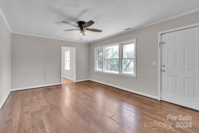 entryway featuring hardwood / wood-style flooring, crown molding, and ceiling fan