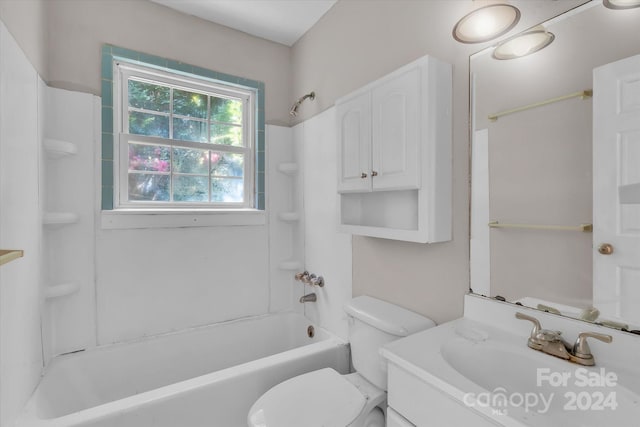 full bathroom featuring vanity, toilet, and  shower combination