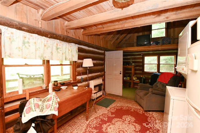 living room with stacked washing maching and dryer, lofted ceiling with beams, log walls, and wooden ceiling