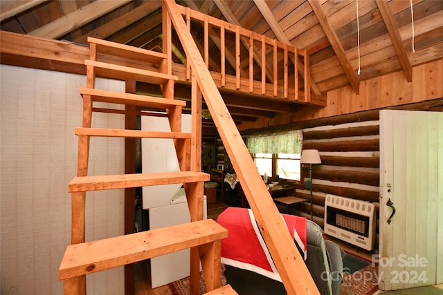 stairs featuring wooden ceiling and lofted ceiling with beams