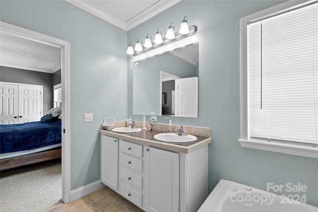 bathroom featuring dual vanity, tile patterned floors, and ornamental molding