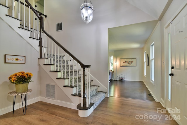 foyer entrance featuring hardwood / wood-style flooring