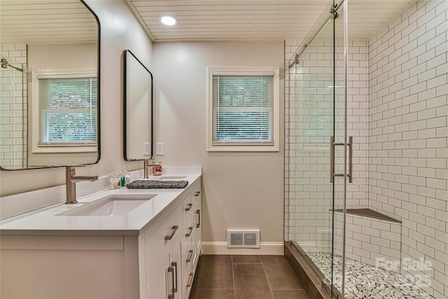 bathroom featuring vanity, an enclosed shower, tile patterned floors, and wooden ceiling