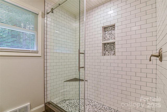 bathroom with walk in shower