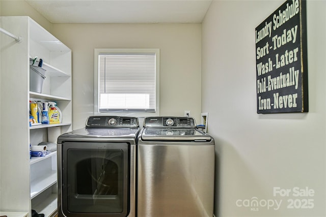 laundry area with washing machine and dryer