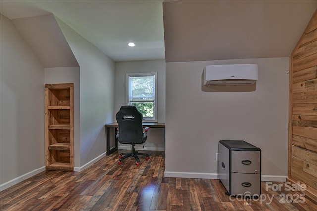 office with dark wood-type flooring, vaulted ceiling, and a wall unit AC