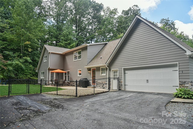 view of front of home featuring a garage