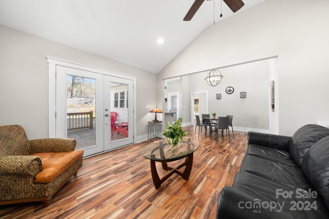 living room with french doors, hardwood / wood-style flooring, high vaulted ceiling, and ceiling fan