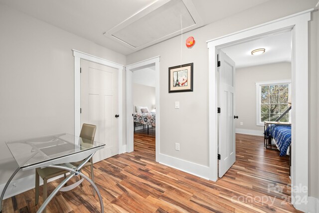 home office featuring hardwood / wood-style flooring