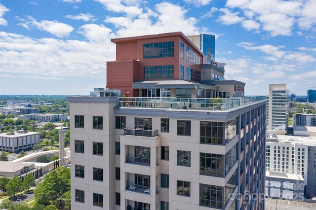 view of building exterior featuring a view of city