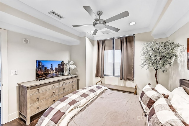 bedroom with ceiling fan and visible vents