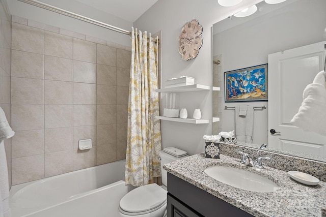 bathroom with vanity, toilet, and shower / tub combo with curtain