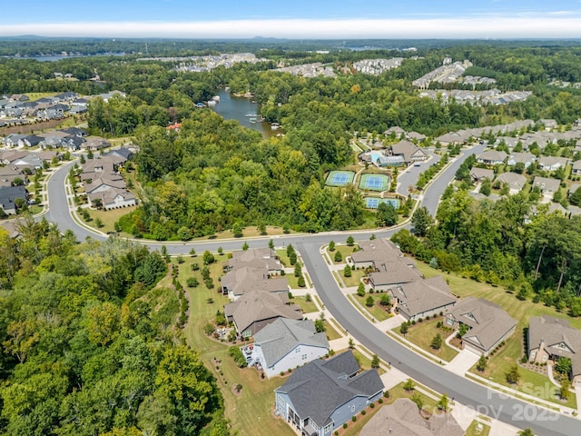 bird's eye view with a water view and a residential view