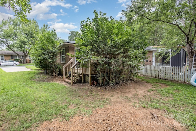 view of yard with fence