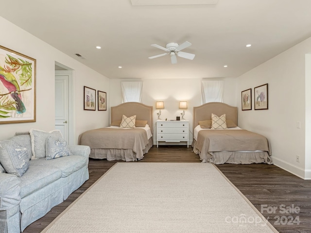 bedroom featuring dark wood-type flooring and ceiling fan