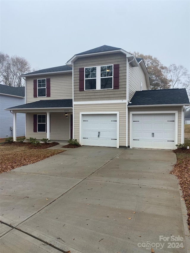 view of front of home with a garage