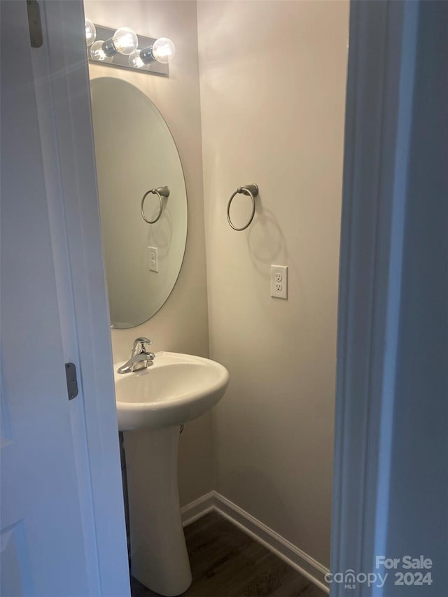 bathroom featuring hardwood / wood-style floors and sink