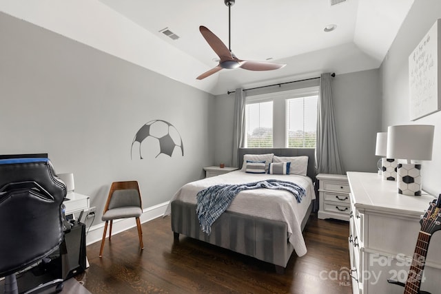 bedroom with ceiling fan, dark hardwood / wood-style flooring, and lofted ceiling