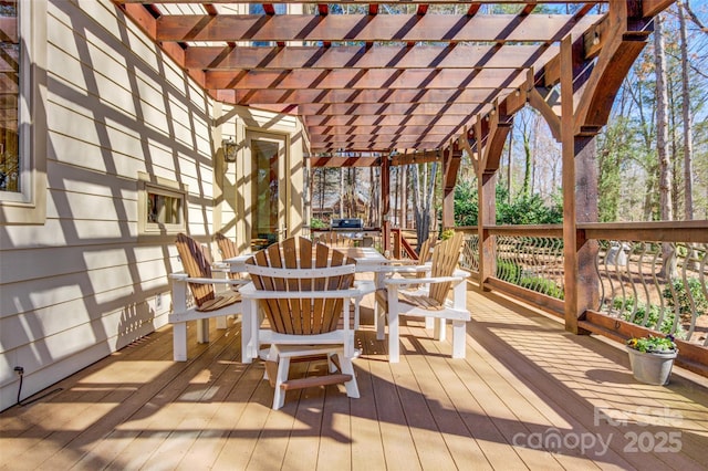 wooden deck with outdoor dining space and a pergola