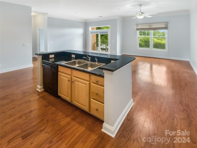 kitchen featuring dark hardwood / wood-style floors, dishwasher, an island with sink, sink, and crown molding