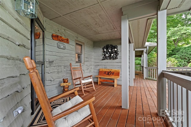 deck with covered porch