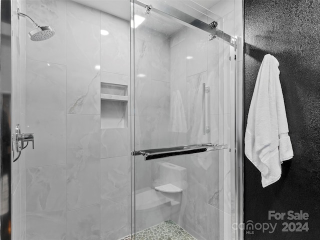 full bathroom with a shower stall