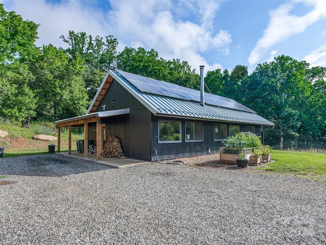 view of front of home with solar panels