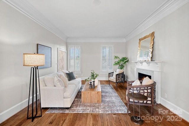 living room with crown molding and hardwood / wood-style floors