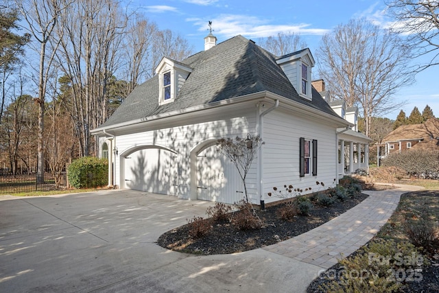 view of home's exterior with a garage