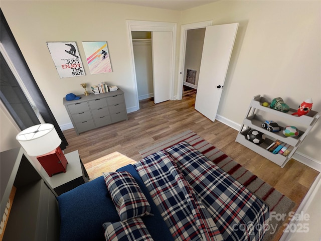 sitting room featuring light wood-type flooring