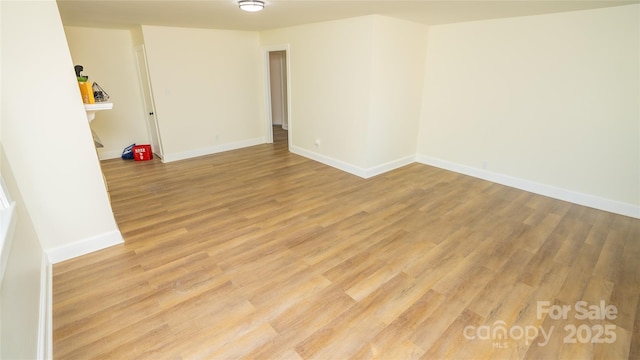 empty room featuring light hardwood / wood-style floors