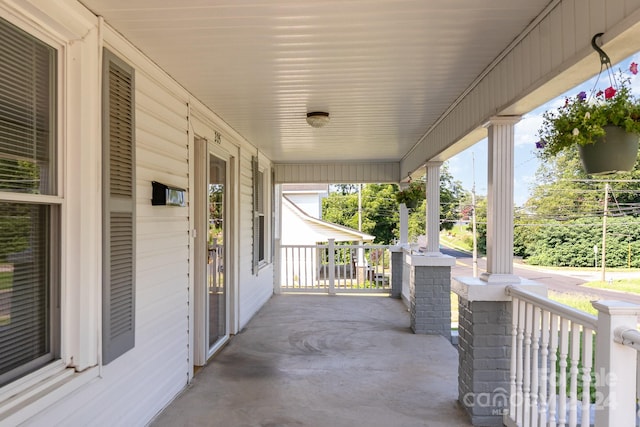 view of patio featuring a porch