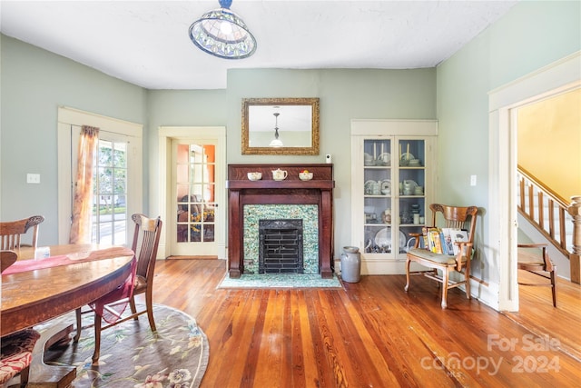 dining space with hardwood / wood-style floors