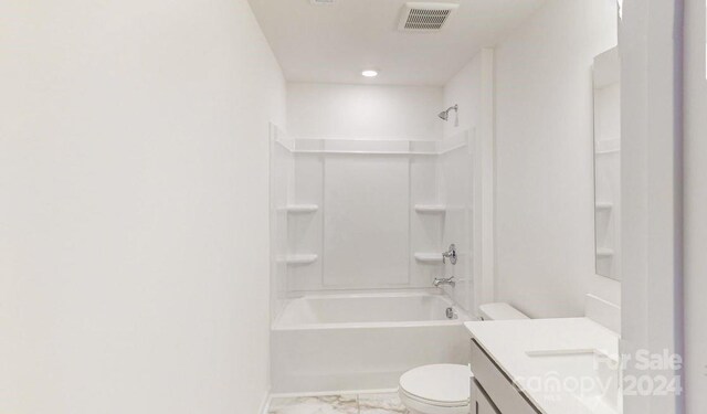 full bathroom featuring vanity, bathing tub / shower combination, and toilet