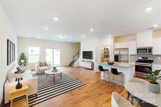 living room featuring light hardwood / wood-style floors