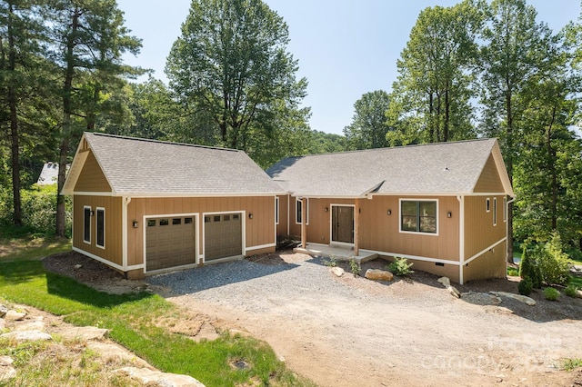 654 Hollybrook Dr, Flat Rock, NC 28731 - view of front of home with a garage, driveway, roof with shingles, and crawl space