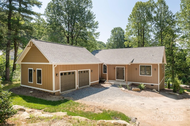654 Hollybrook Dr, Flat Rock, NC 28731 - view of front facade featuring roof with shingles, an attached garage, driveway, and crawl space